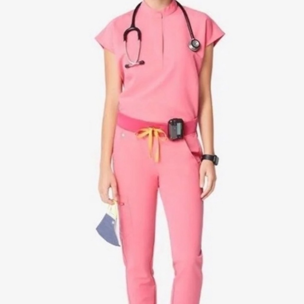 Limited edition neon pink Figs, never worn
